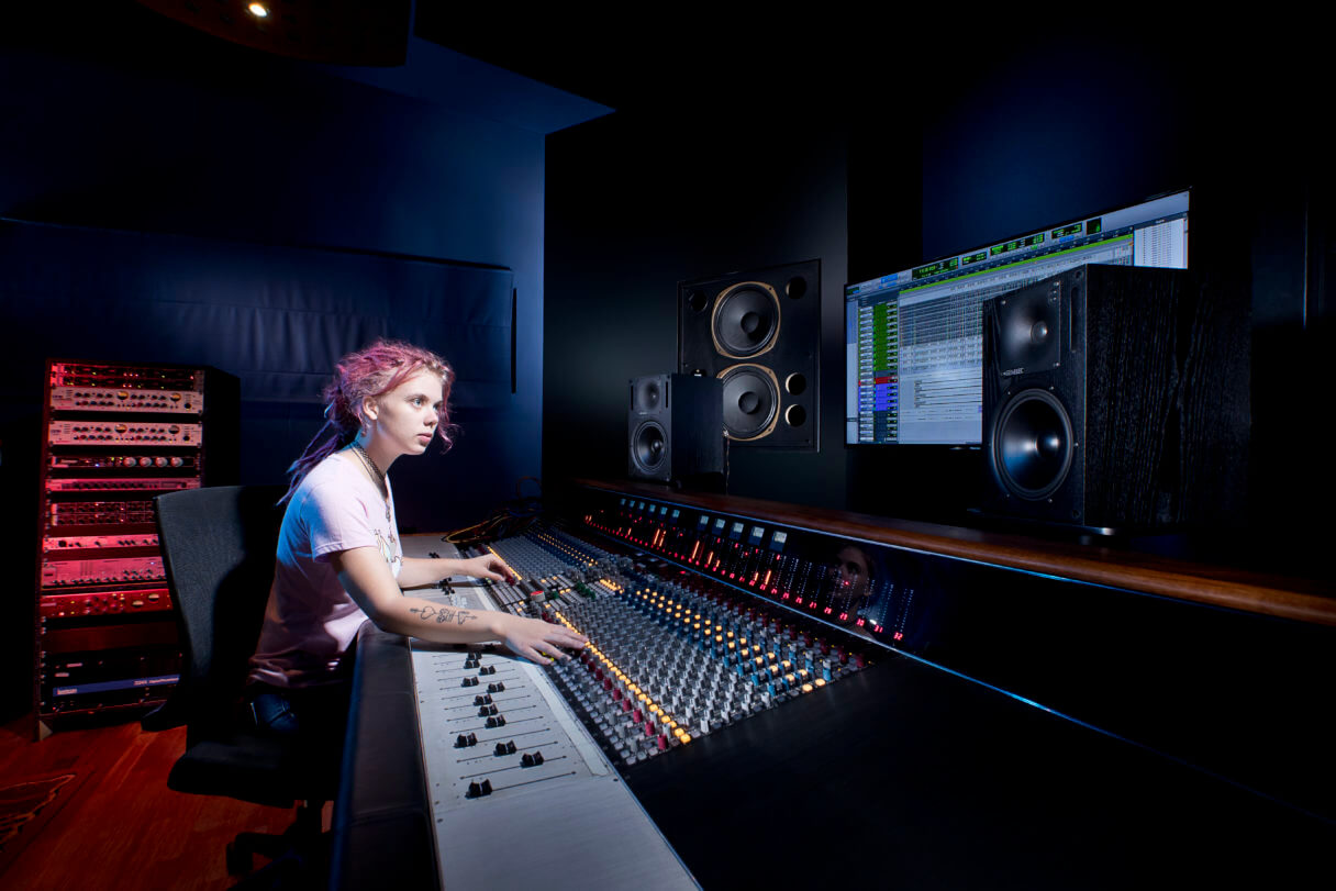 SAE AUS Image BYR Audio Female Student on Neve Audio Desk scaledHigher Certificate in Sound Production | Online | SAE Institute South Africa
